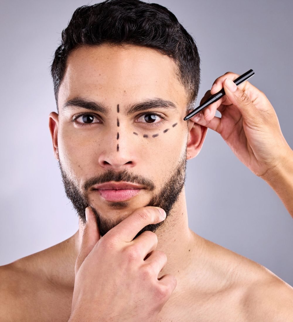 Im not sure if its enough. Shot of a man with cosmetic surgery markings on his face
